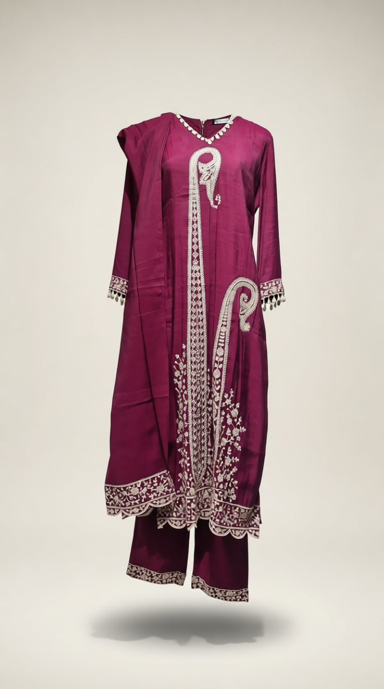 N Emb Muslin Buti Suit
